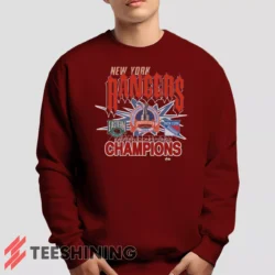 Male model lounging in the 1994 New York Rangers Eastern Conference Champions Classic Hockey Men's Sweatshirt in maroon. Made from ultra-soft fabric for unmatched comfort.
