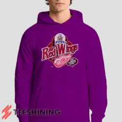 Male model showcasing the 90s Detroit Red Wings Western Conference Champs Vintage Hockey Fan Men's Hoodie in purple. This ultra-cozy pullover hoodie is designed for warmth and everyday versatility.