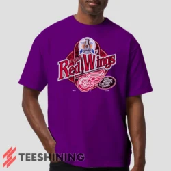 Male model wearing the 90s Detroit Red Wings Western Conference Champs Vintage Hockey Fan Men's T-Shirt in purple. Crafted from ultra-soft cotton, this classic crew neck tee offers breathable comfort and effortless style.
