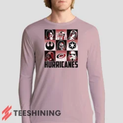 Male model sporting the Carolina Hurricanes Star Wars Heroes And Villains Men's Long Sleeve T-Shirt in light pink. Lightweight and breathable, ideal for transitional weather.