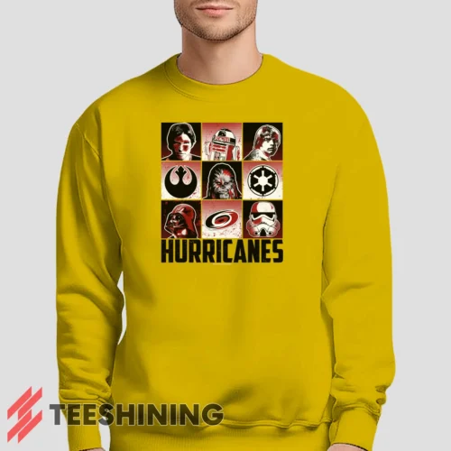 Male model lounging in the Carolina Hurricanes Star Wars Heroes And Villains Men's Sweatshirt in yellow. Made from ultra-soft fabric for unmatched comfort.