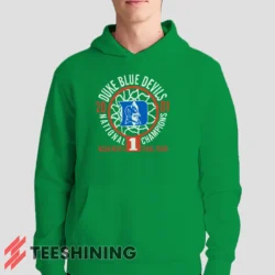 Male model showcasing the Duke Blue Devils 2001 Nation Champions Ncaa Men's Hoodie in irish green. This ultra-cozy pullover hoodie is designed for warmth and everyday versatility.