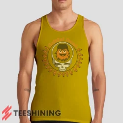 Male model wearing the Grateful Dead Gritty Philadelphia Flyers Men's Tank Top in yellow. A perfect blend of comfort and breathability for workouts or summer days.