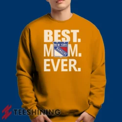 Male model lounging in the New York Rangers Best Mom Ever Hockey Team Gift for Moms Men's Sweatshirt in orange. Made from ultra-soft fabric for unmatched comfort.