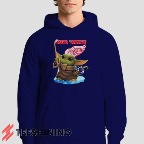 Male model showcasing the Star Wars Baby Yoda Detroit Red Wings Fun NHL Sci - Fi Fan Men's Hoodie in navy. This ultra-cozy pullover hoodie is designed for warmth and everyday versatility.
