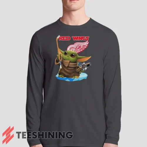 Male model sporting the Star Wars Baby Yoda Detroit Red Wings Fun NHL Sci - Fi Fan Men's Long Sleeve T-Shirt in charcoal. Lightweight and breathable, ideal for transitional weather.