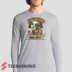 Male model sporting the UCF Golden Knights 2007 Liberty Bowl Men's Long Sleeve T-Shirt in white. Lightweight and breathable, ideal for transitional weather.