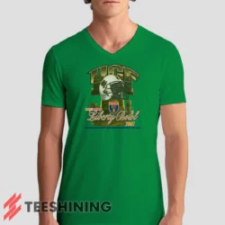 Male model rocking the UCF Golden Knights 2007 Liberty Bowl Men's V-Neck T-Shirt in irish green. Featuring a modern V-neck cut, perfect for a stylish yet casual look.