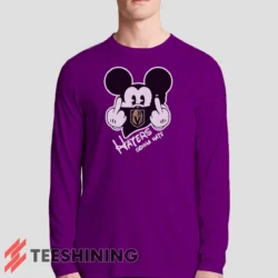 Male model sporting the Vegas Golden Knights Haters Gonna Hate Mickey Mouse Disney Hockey Men's Long Sleeve T-Shirt in purple. Lightweight and breathable, ideal for transitional weather.