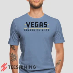 Male model wearing the Vegas Golden Knights Men's T-Shirt in light blue. Crafted from ultra-soft cotton, this classic crew neck tee offers breathable comfort and effortless style.
