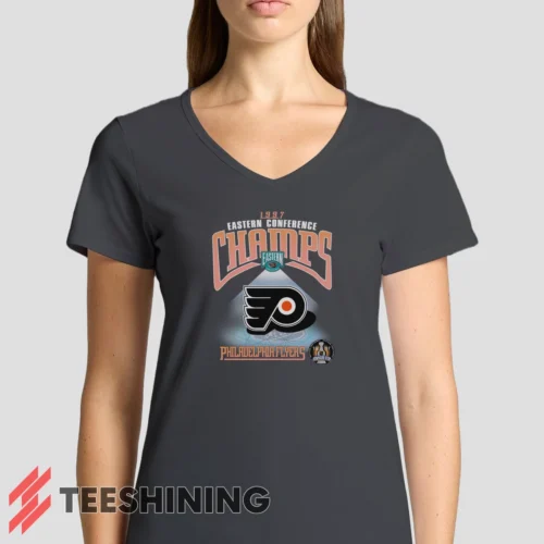 Female model rocking the 1997 Philadelphia Flyers NHL Hockey Women's V-Neck T-Shirt in charcoal. Featuring a modern V-neck cut, perfect for a stylish yet casual look.