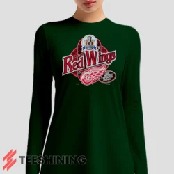 Female model sporting the 90s Detroit Red Wings Western Conference Champs Vintage Hockey Fan Women's Long Sleeve T-Shirt in forest green. Lightweight and breathable, ideal for transitional weather.
