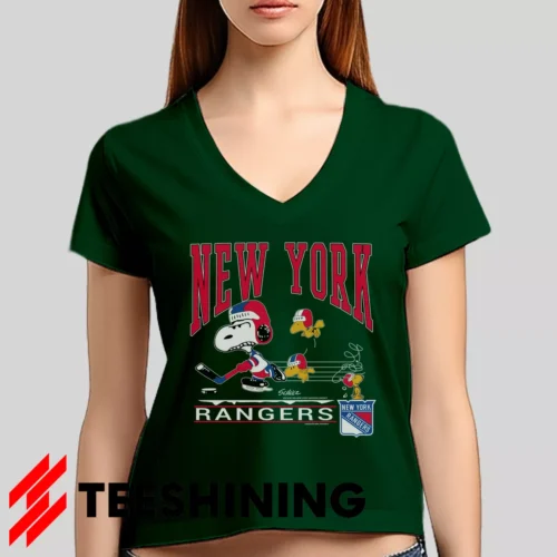 Female model rocking the 90s New York Rangers Snoopy Peanuts NHL Hockey Vintage Fan Women's V-Neck T-Shirt in forest green. Featuring a modern V-neck cut, perfect for a stylish yet casual look.