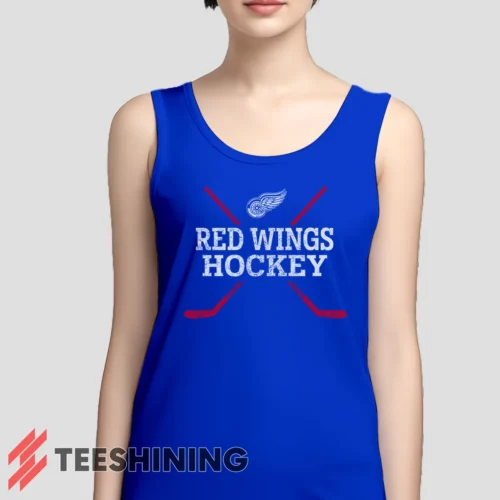 Female model wearing the Detroit Red Wings Hockey Women's Tank Top in royal blue. A perfect blend of comfort and breathability for workouts or summer days.