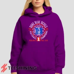 Female model showcasing the Duke Blue Devils 2001 Nation Champions Ncaa Women's Hoodie in purple. This ultra-cozy pullover hoodie is designed for warmth and everyday versatility.