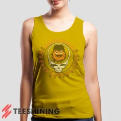 Female model wearing the Grateful Dead Gritty Philadelphia Flyers Women's Tank Top in yellow. A perfect blend of comfort and breathability for workouts or summer days.