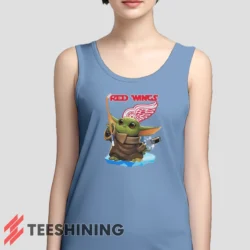 Female model wearing the Star Wars Baby Yoda Detroit Red Wings Fun NHL Sci - Fi Fan Women's Tank Top in light blue. A perfect blend of comfort and breathability for workouts or summer days.