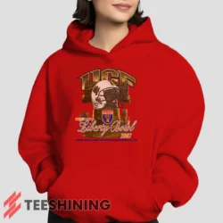 Female model showcasing the UCF Golden Knights 2007 Liberty Bowl Women's Hoodie in red. This ultra-cozy pullover hoodie is designed for warmth and everyday versatility.