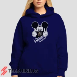 Female model showcasing the Vegas Golden Knights Haters Gonna Hate Mickey Mouse Disney Hockey Women's Hoodie in navy. This ultra-cozy pullover hoodie is designed for warmth and everyday versatility.